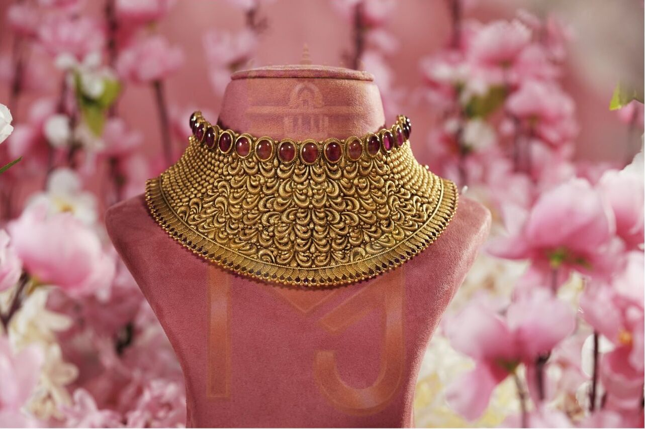 Indian woman in traditional gold jewellery